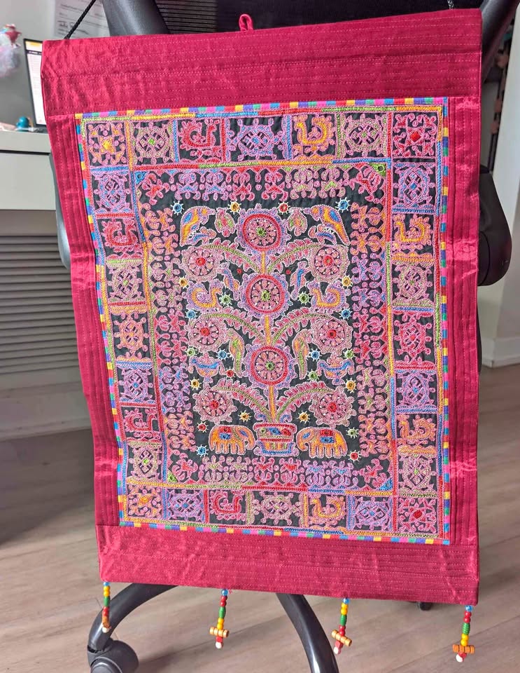 Hand embroidered wall hanging