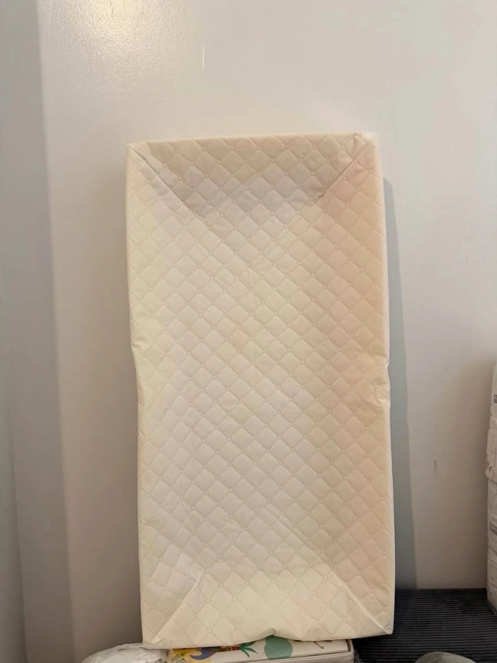 White Wooden Baby Changing Table with Quilted Pad