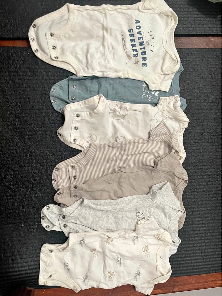 7 Carter’s onesie tops