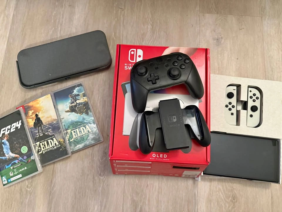 Nintendo Switch OLED Bundle with Pro Controller and 3 Games