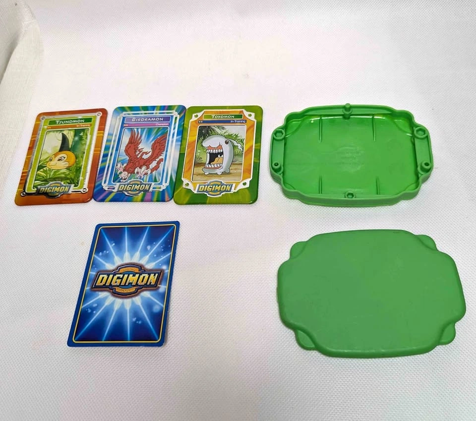 Vintage Digimon Metal Collector Tins, SaberLeomon Card, and Stor