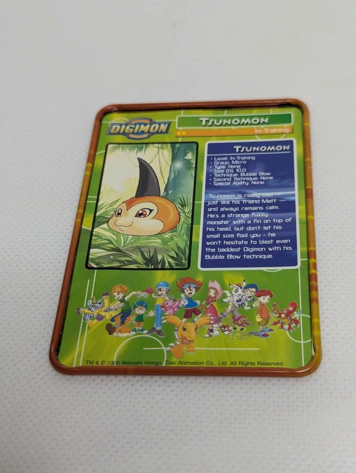 Vintage Digimon Metal Collector Tins, SaberLeomon Card, and Stor - photo 4