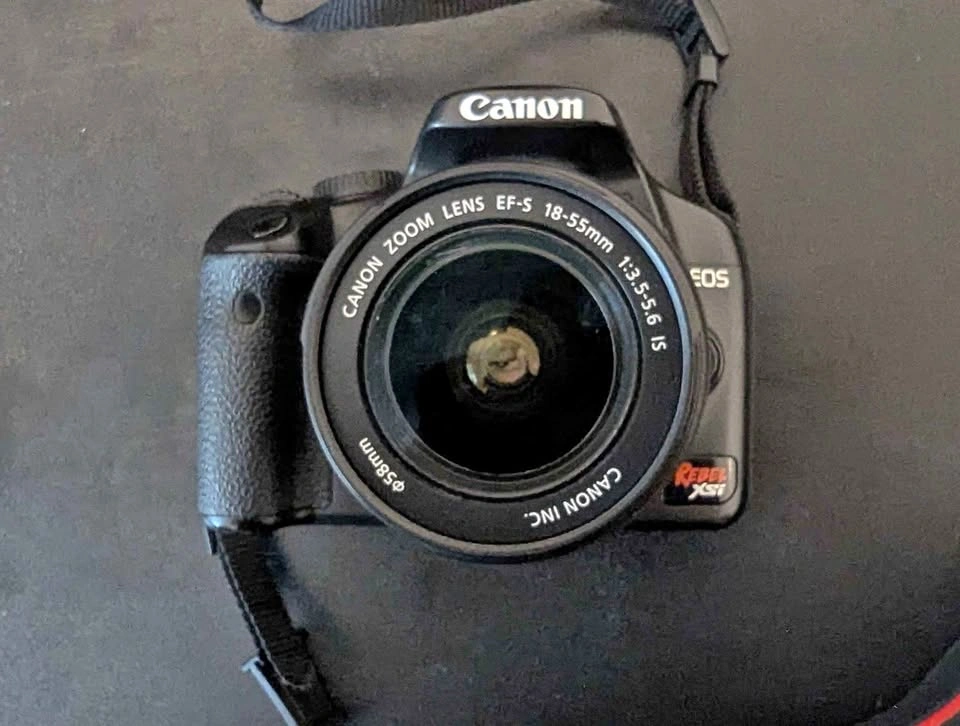 Canon EOS Rebel XSi with 18-55mm, 50mm and 75-300mm Lenses