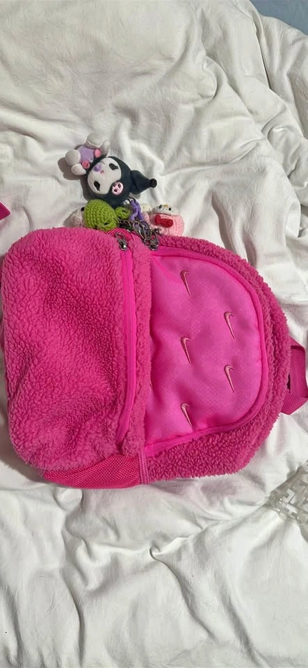 Nike pink bag with charms
