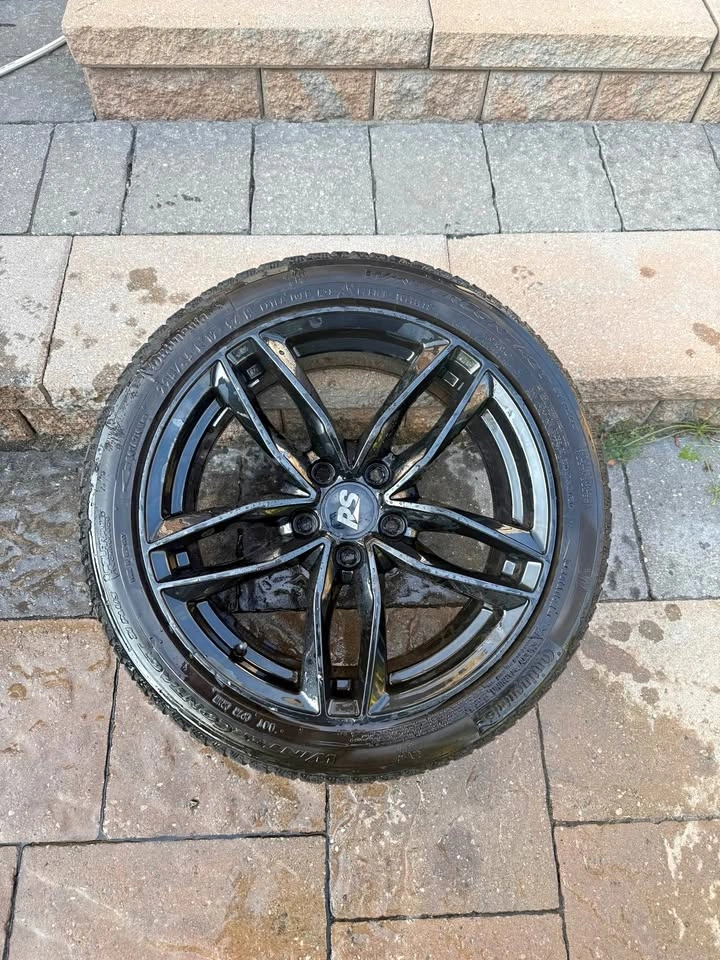 Continental 225/45 R17 Tires with Black RS Wheels
