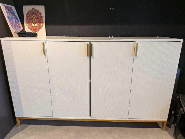 Modern White Storage Cabinet with Gold Accents