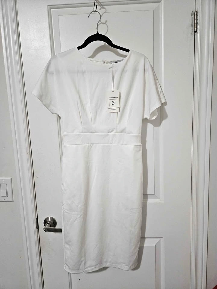 White Bodycon Dress still with its tag