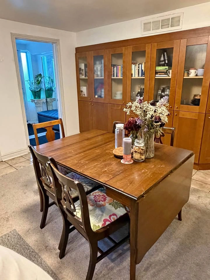 Wooden drop-leaf dining table with 5 chairs