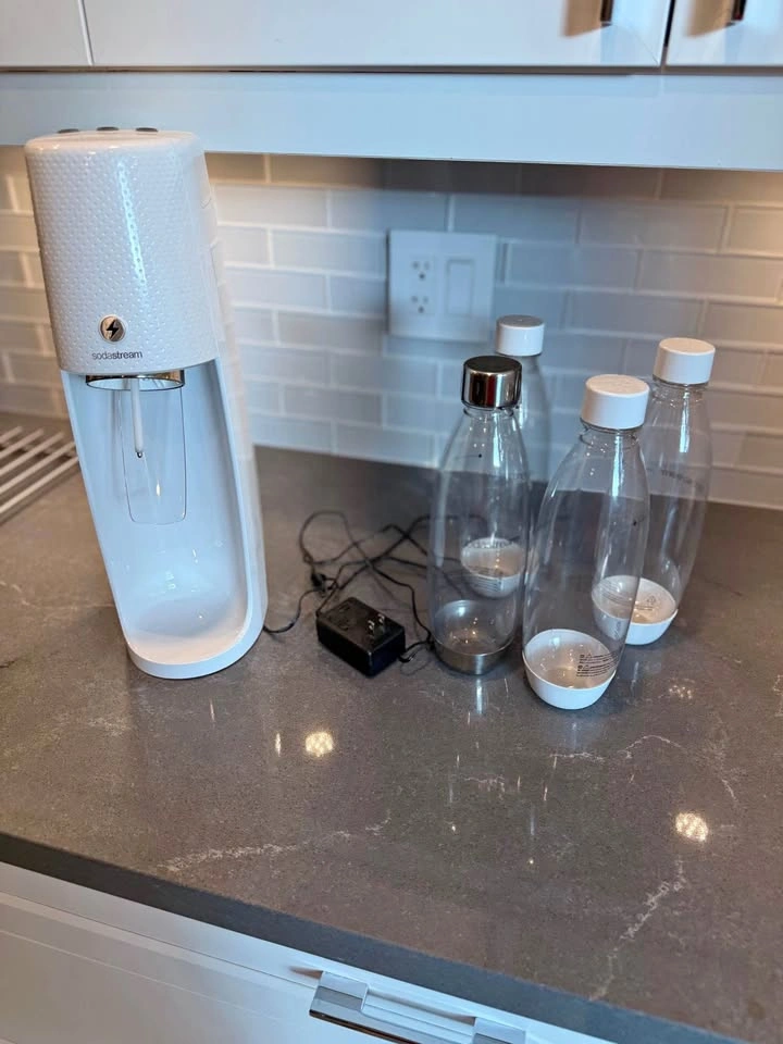 SodaStream Source Electric Sparkling Water Maker + 4 Bottles