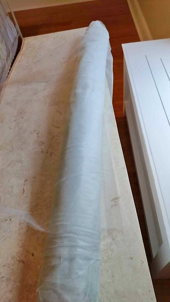 Light Shimmering Blue Tulle Fabric Roll