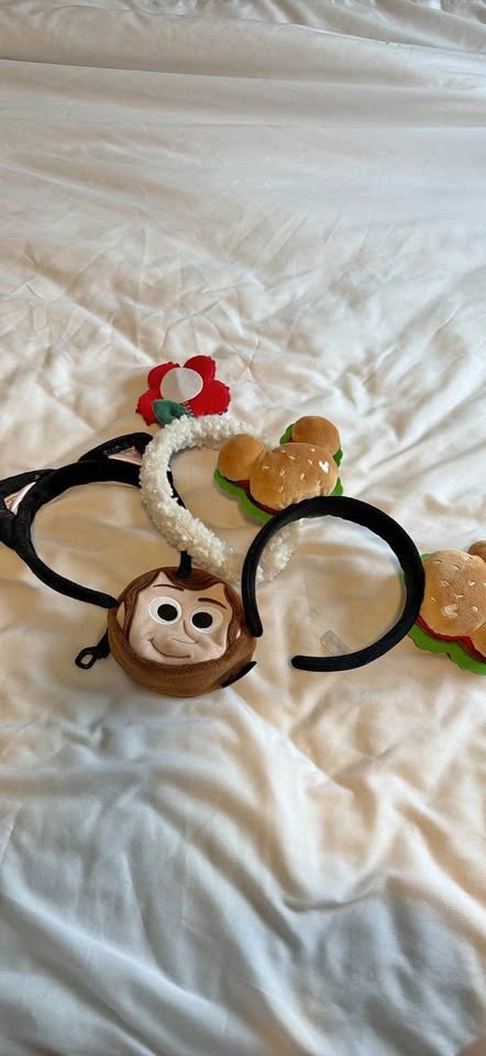 Disney Mickey Mouse Burger Ears, Woody Coin Purse, and Flower He