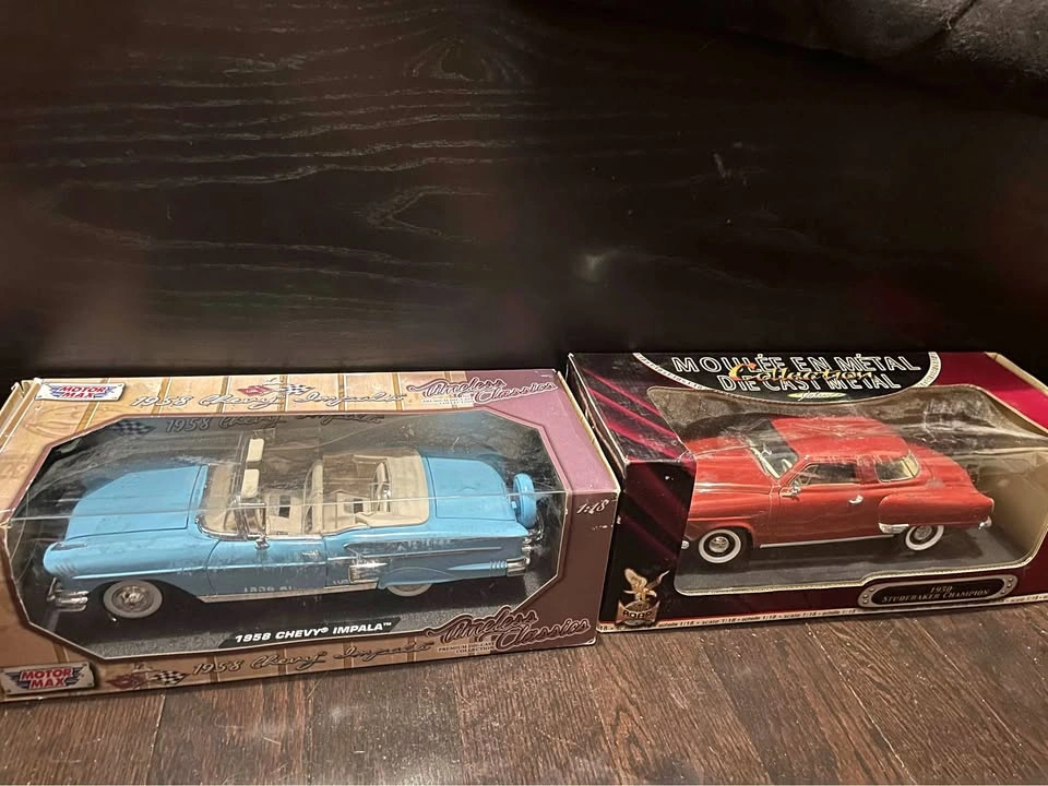 2 rare 1:18 scale model cars in the box