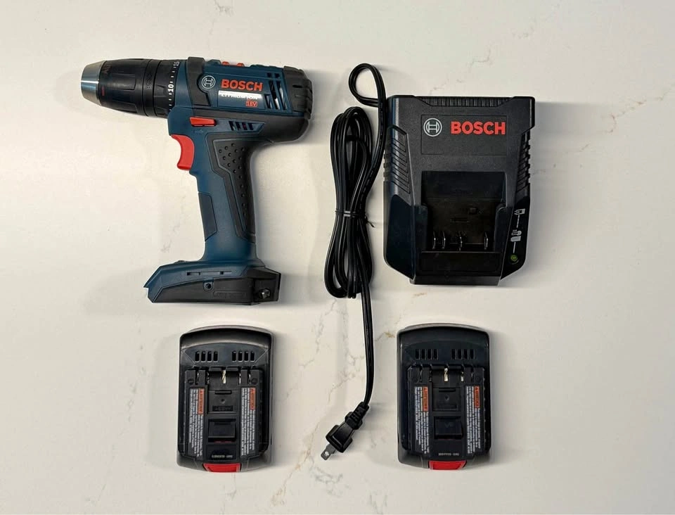 Bosch 18V power drill with 2 Li-ion batteries/charger and bits