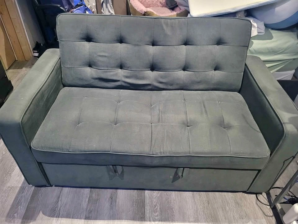 Love seat that is a bed