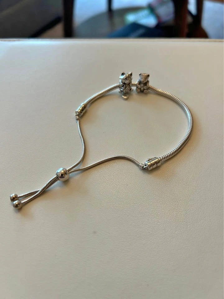 Pandora adjustable bracelet with 2 charms (bear and a cat)