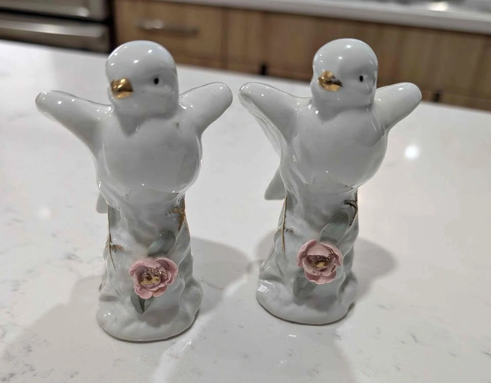 A set of 2 Porcelain Bird Figures