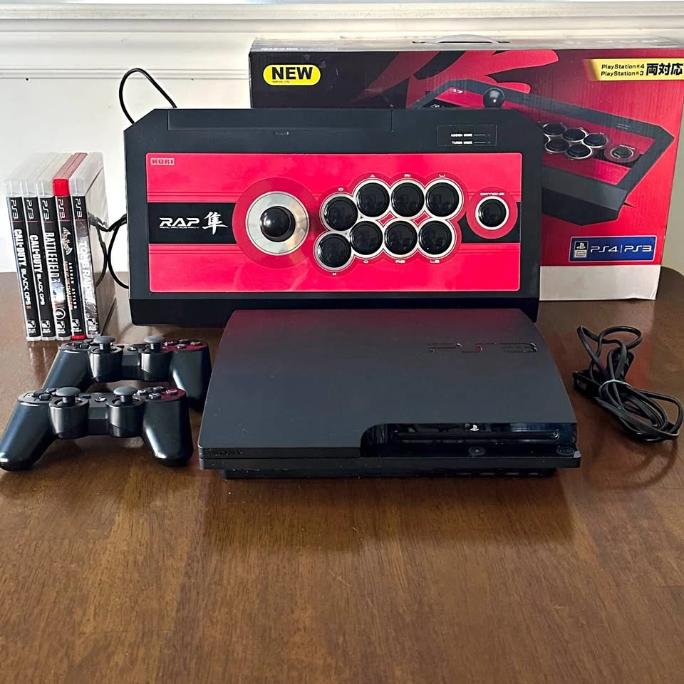 PS3 Slim Bundle, 2 Controllers, 5 Games & Hori Fightstick