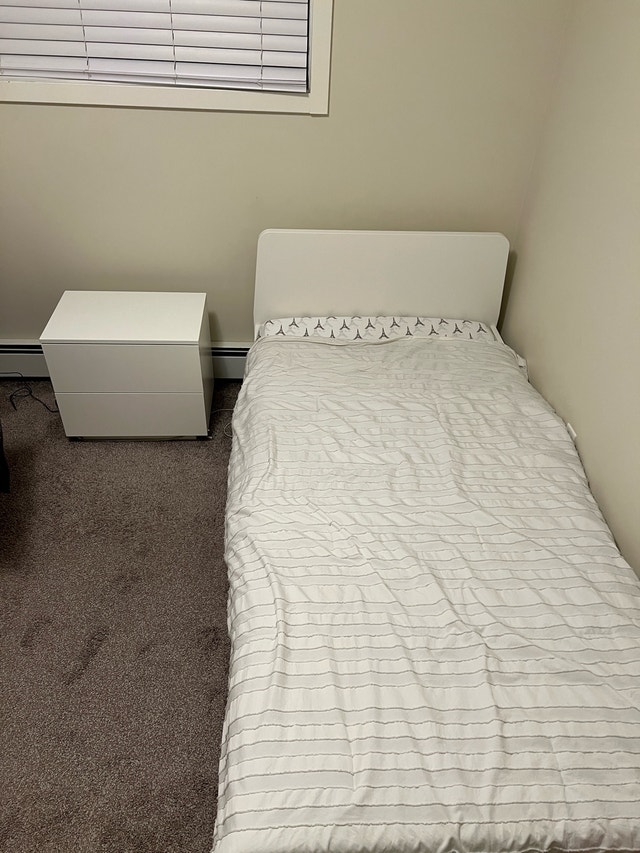 Bed and side table