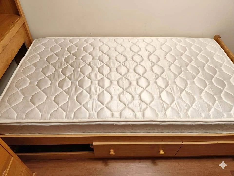 Twin storage bed with mattress and headboard