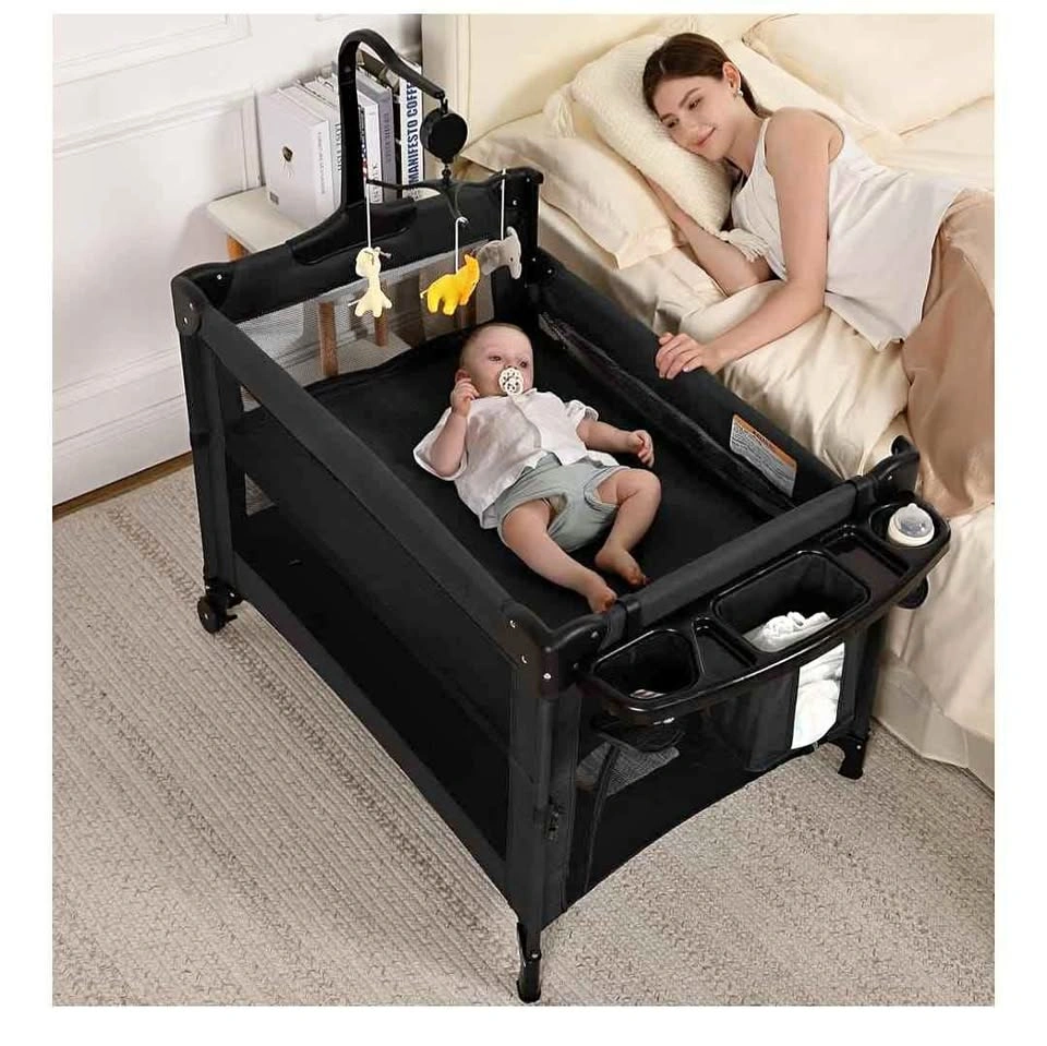 4-in-1 Portable Baby Playard, Crib, Bassinet, and Changer