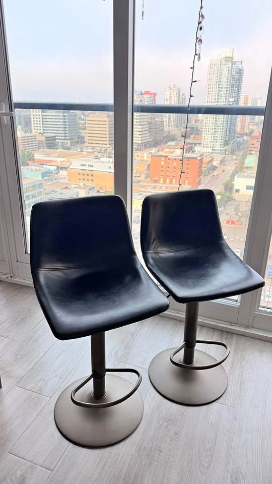 Pair of Black Swivel Bar Stools