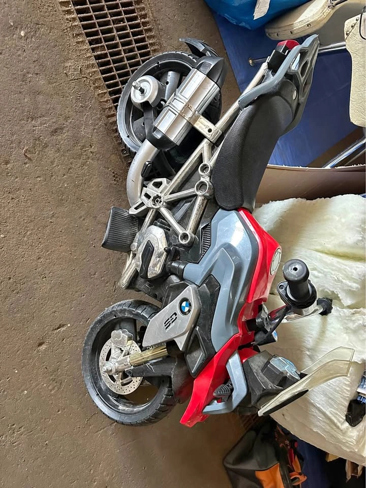 Kids ride on motor bike