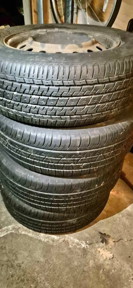 Firestone All-Season Tire on Rims 215 65R16