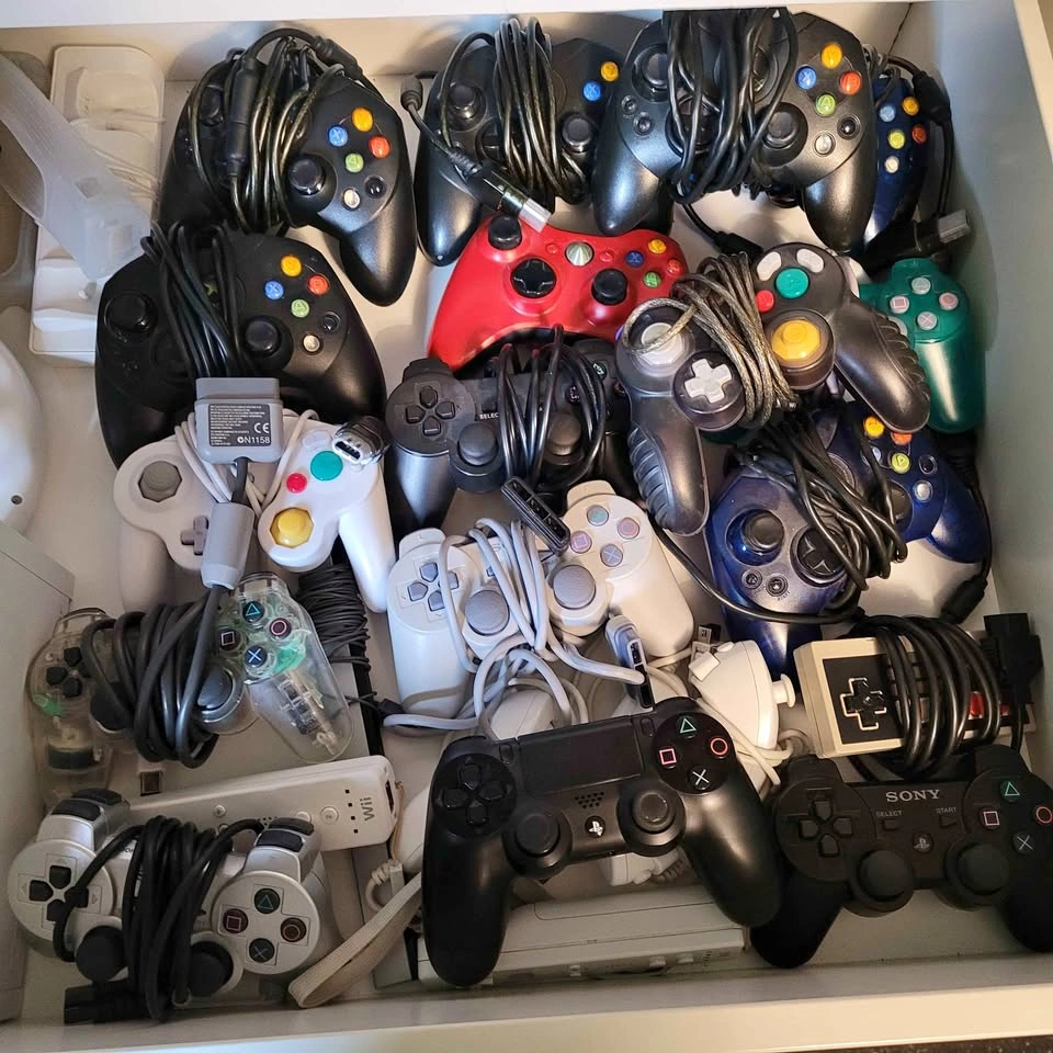 Various Video Game Controllers and Accessories