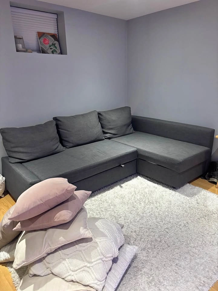 FRIHETEN dark grey pull out couch