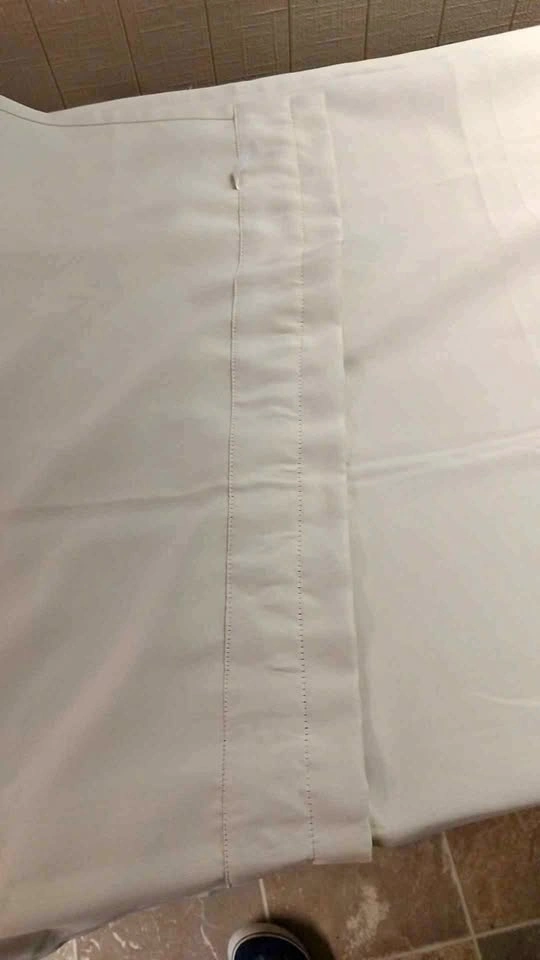 2 panels of Beige Blackout Curtains 38" W by 74" L