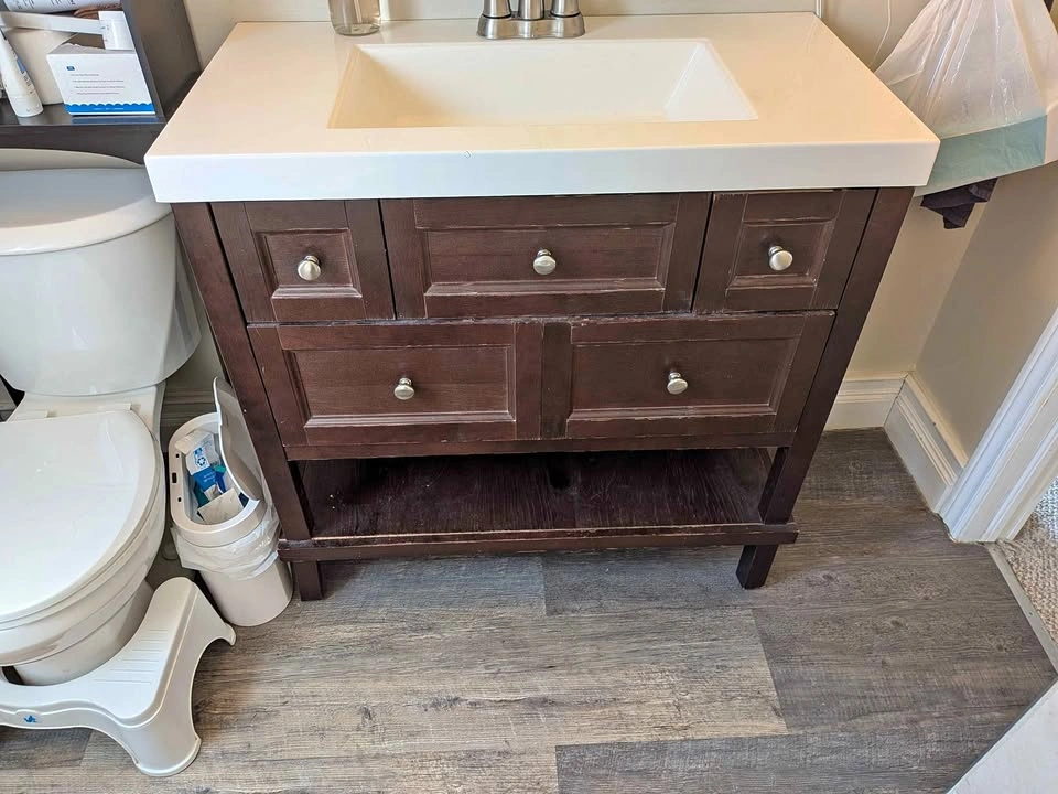 Dark Wood Bathroom Vanity with Sink and Faucet