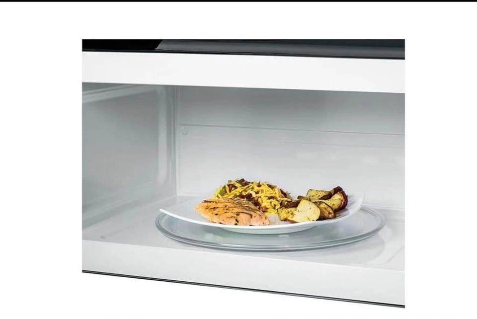 GE Over-the-Range Microwave - photo 4