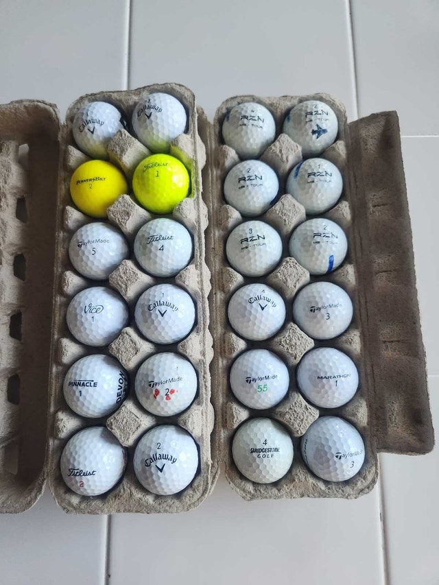 24 Assorted Golf Balls