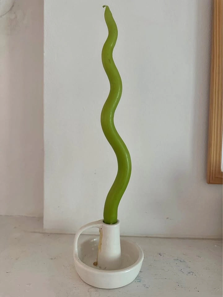 Wavy candle in IKEA candle holder