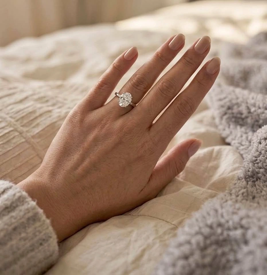 Oval shaped solitaire moissanite diamond ring in sterling silver