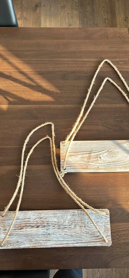 2 wooden shelves with jute rope