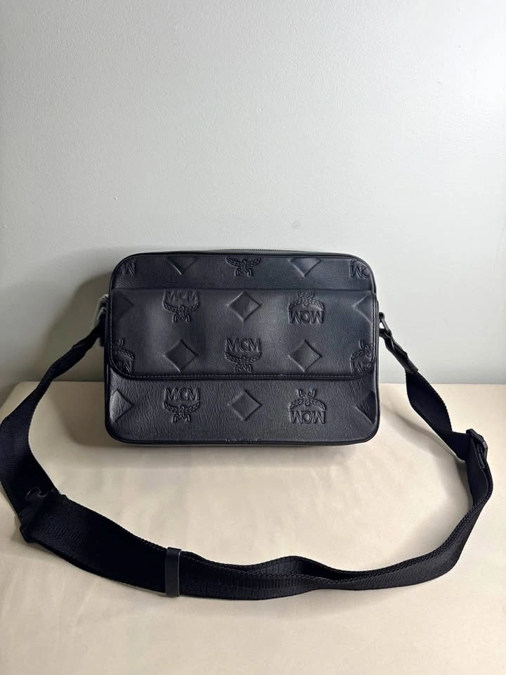 Authentic MCM Eren Maxi Monogram Leather Messenger Bag