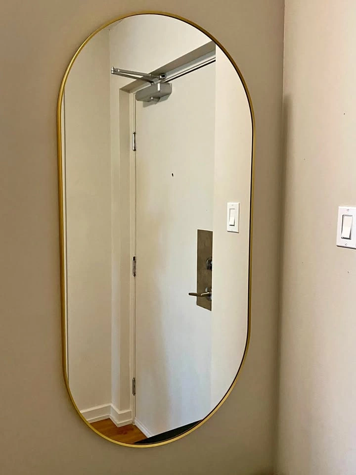 Mirror - gold colour and rounded