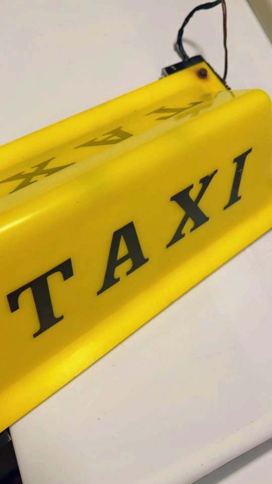Two taxi logos