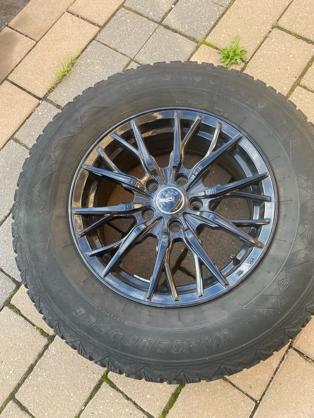 4 winter tires with rims barely used