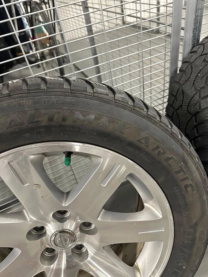 17" Chrysler Rims with winter tires mounted