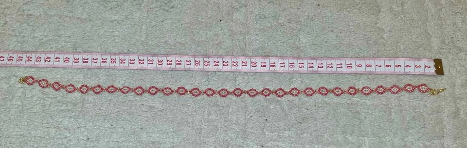 ✨ Elegant Red & Gold Patterned Beaded Necklace