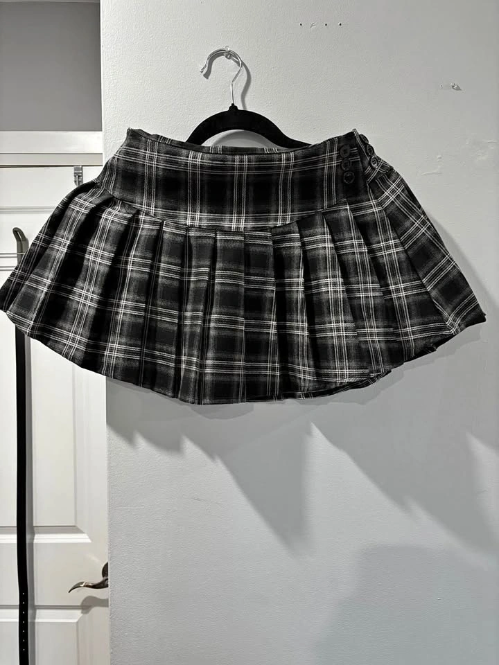 Never worn super cute black plaid mini skirt