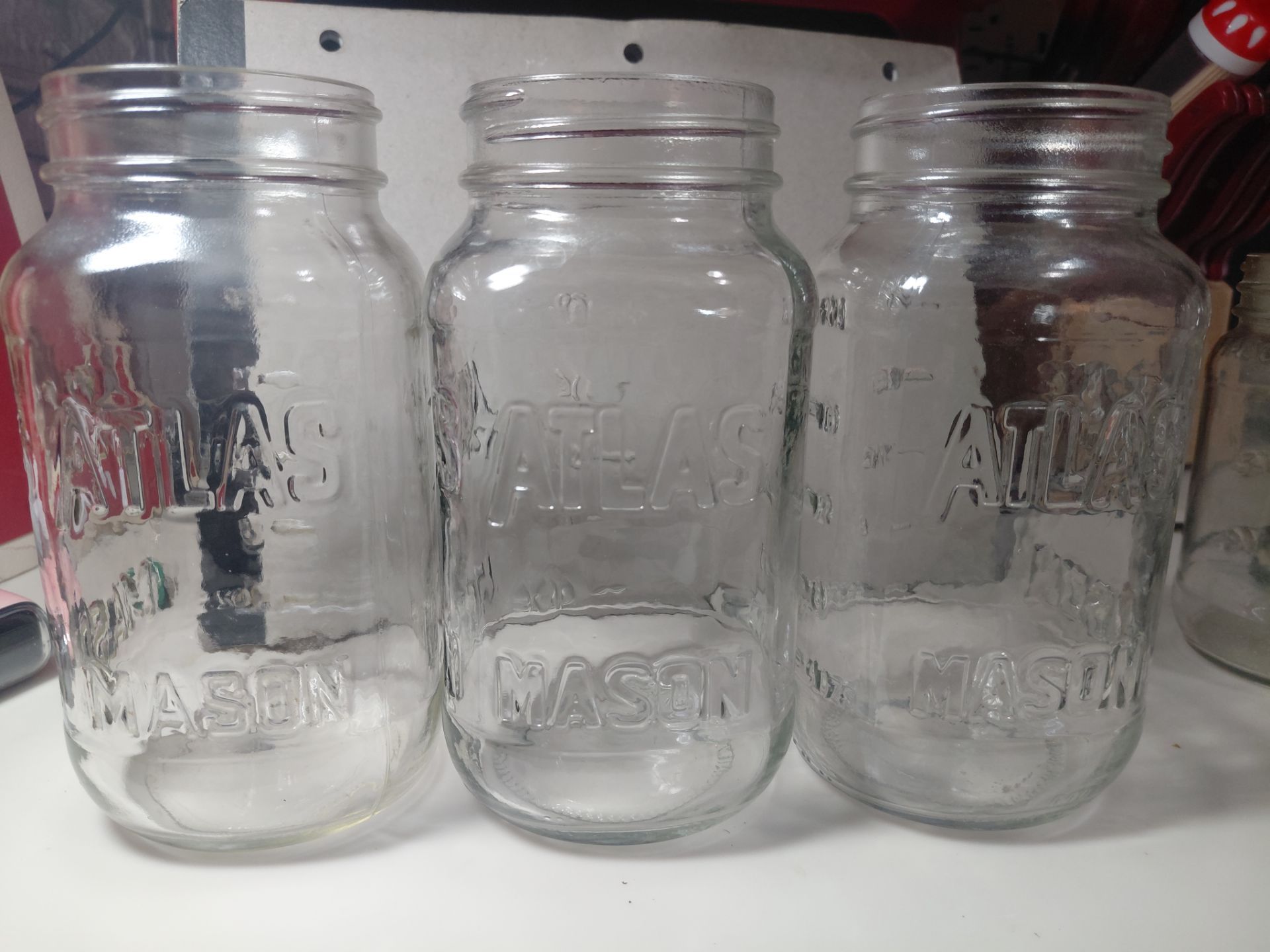 Vintage clear glass Atlas Mason canning jars