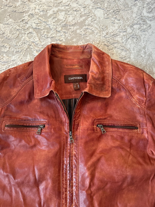 Danier men's distressed leather jacket in a cognac brown hue. - photo 3