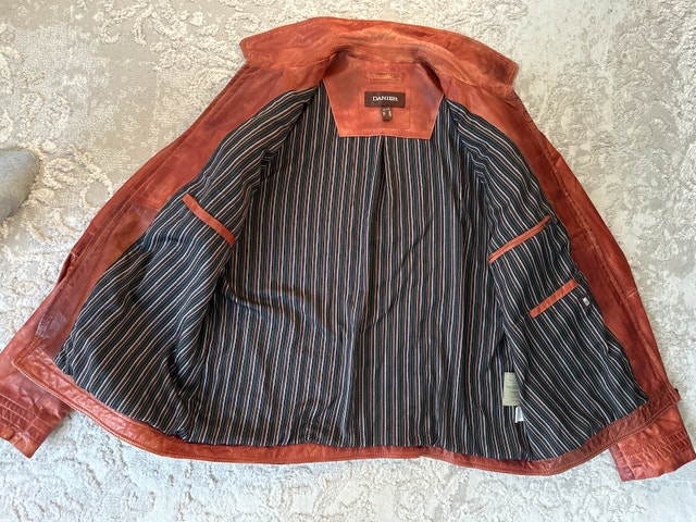 Danier men's distressed leather jacket in a cognac brown hue. - photo 4