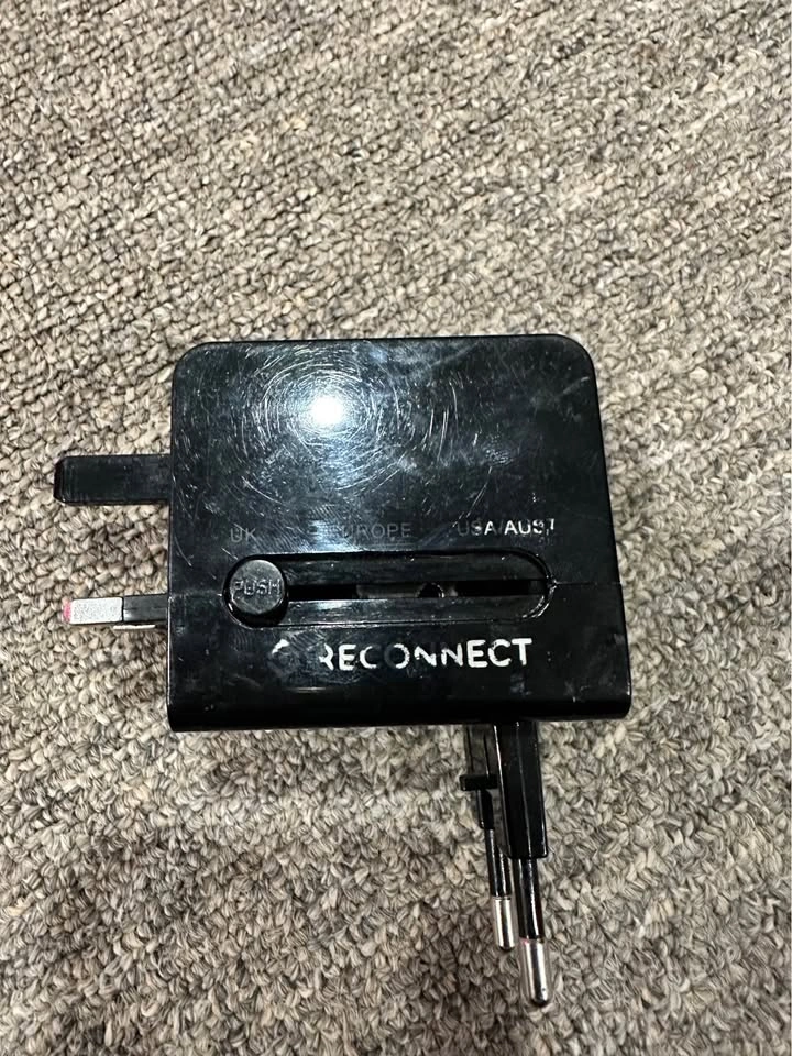 Travel adapter - photo 3