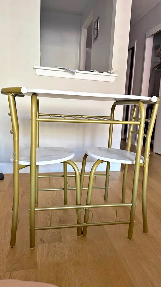 Marble dining table with gold legs