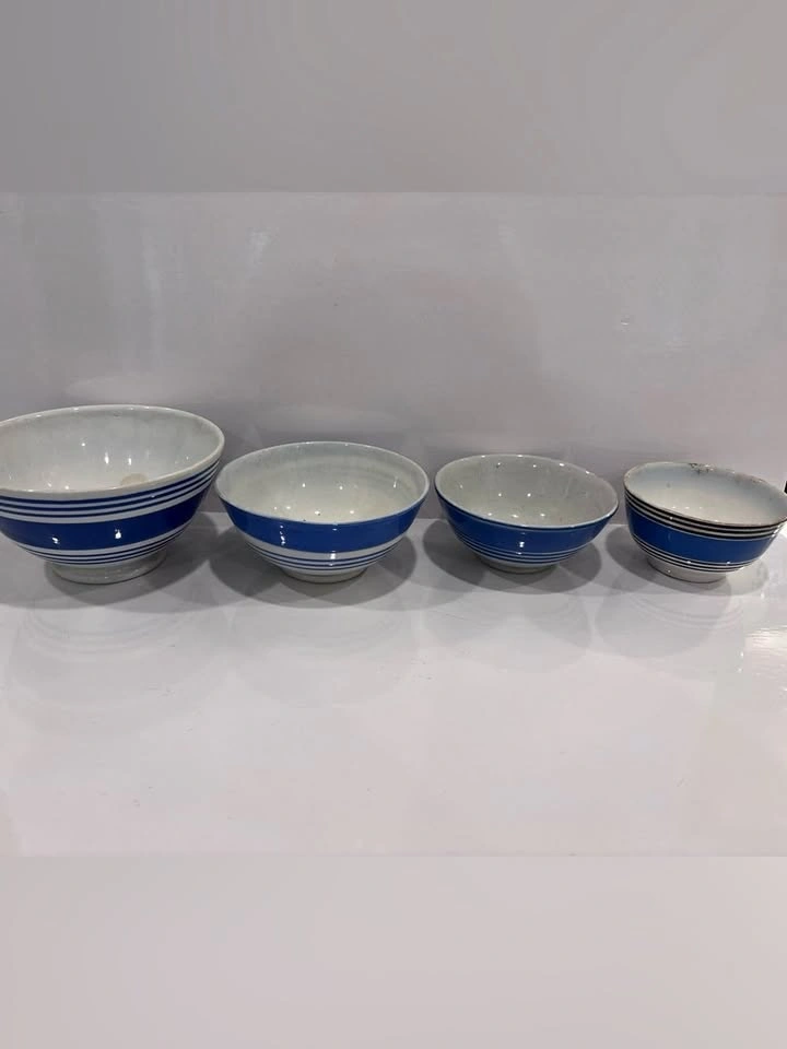 Vintage set of 4 blue banded pottery mixing bowls made in Englan