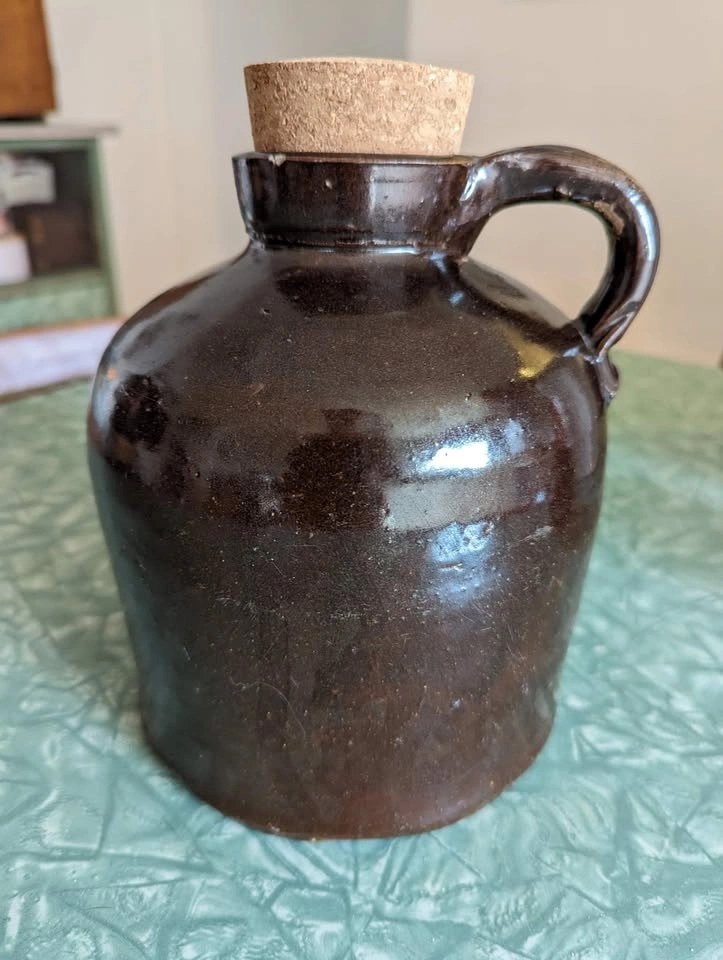 Brown pottery jug - photo 2